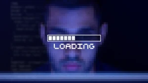 pixelated image of developer with loading bar across eyes