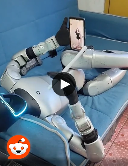humanoid robot relaxes with phone