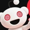editorial image of Reddit Snoo mascot with OpenAI logo in eyes